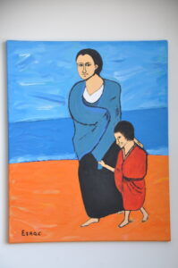 Femme et enfant au bord de le mer